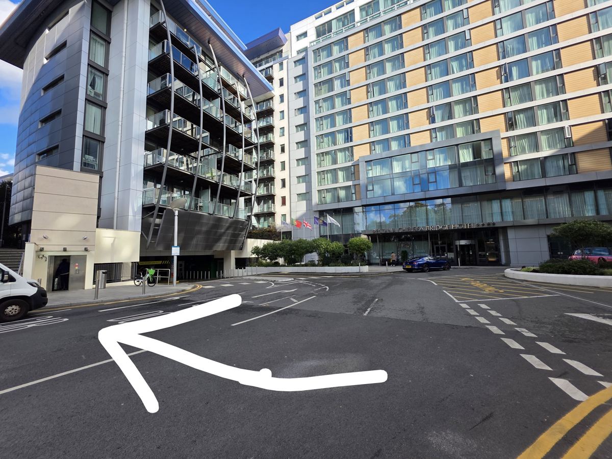 Drop-off, arrow to lift and stairs on the left