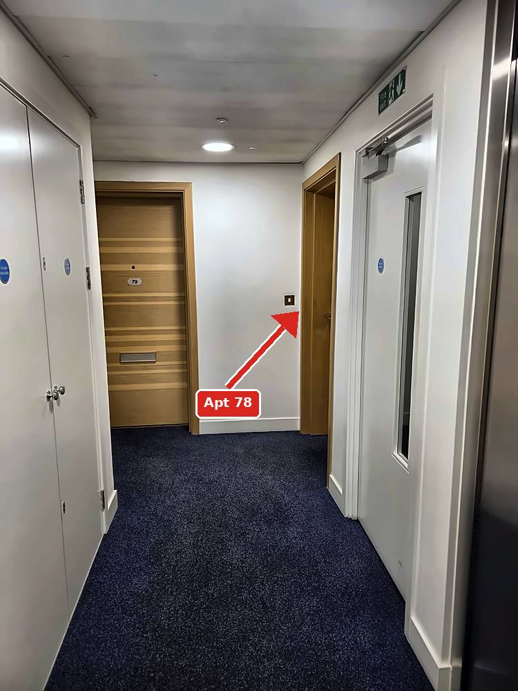 Corridor, arrow to Apt 78